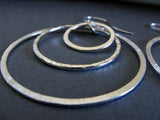 Concentric circle 3 ring dangle silver earring close up