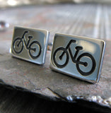 Bike stud earrings. Sterling silver handmade jewelry