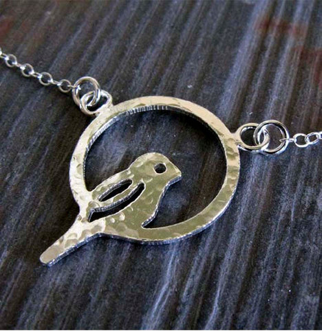 Bird in ring perch dainty sterling silver necklace. Handmade in the USA.