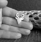 deer rack with antlers tie tack pin shown in hand black and white