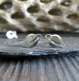Planet Saturn sterling silver stud earrings on gray stone