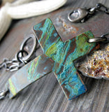 Sideways copper patina cross and sterling silver bracelet