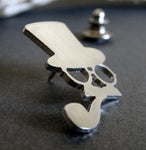 Side view of steampunk top hat man tie tack pin on gray