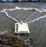 Tiny name pendant necklace handmade in sterling silver