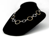 Mixed metal silver and gold ring statement necklace
