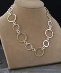 Mixed metal silver and gold ring statement necklace