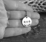 Couples initial anniversary necklace handmade in sterling silver